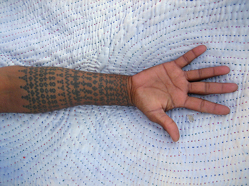 Today's pictures are of tribal hand tattoos. I really enjoy the contrast of